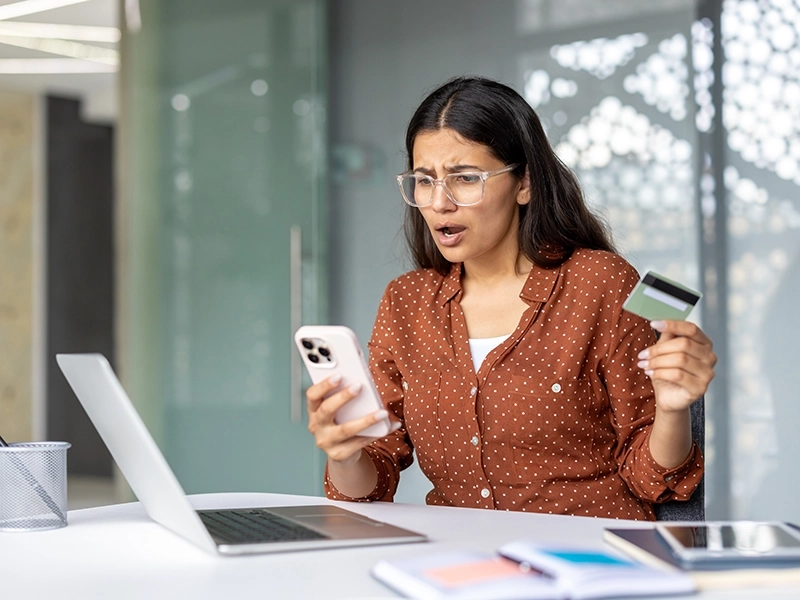 woman looking at phone